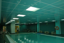 ceiling tiles above swimming pool