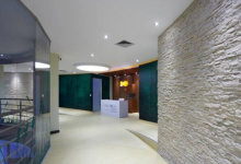 Hallway with suspended ceiling